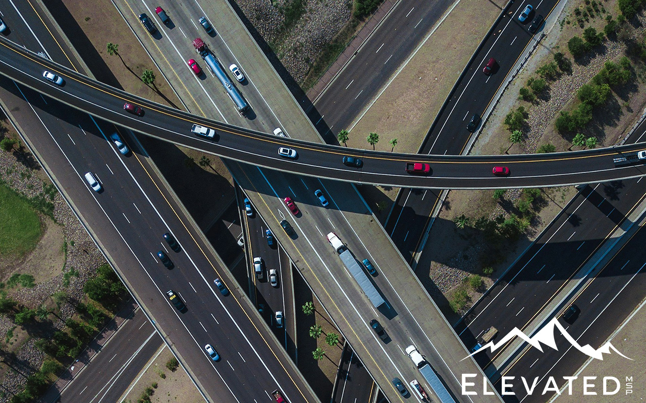 Overhead view of a highway system, transportation infrastructure.